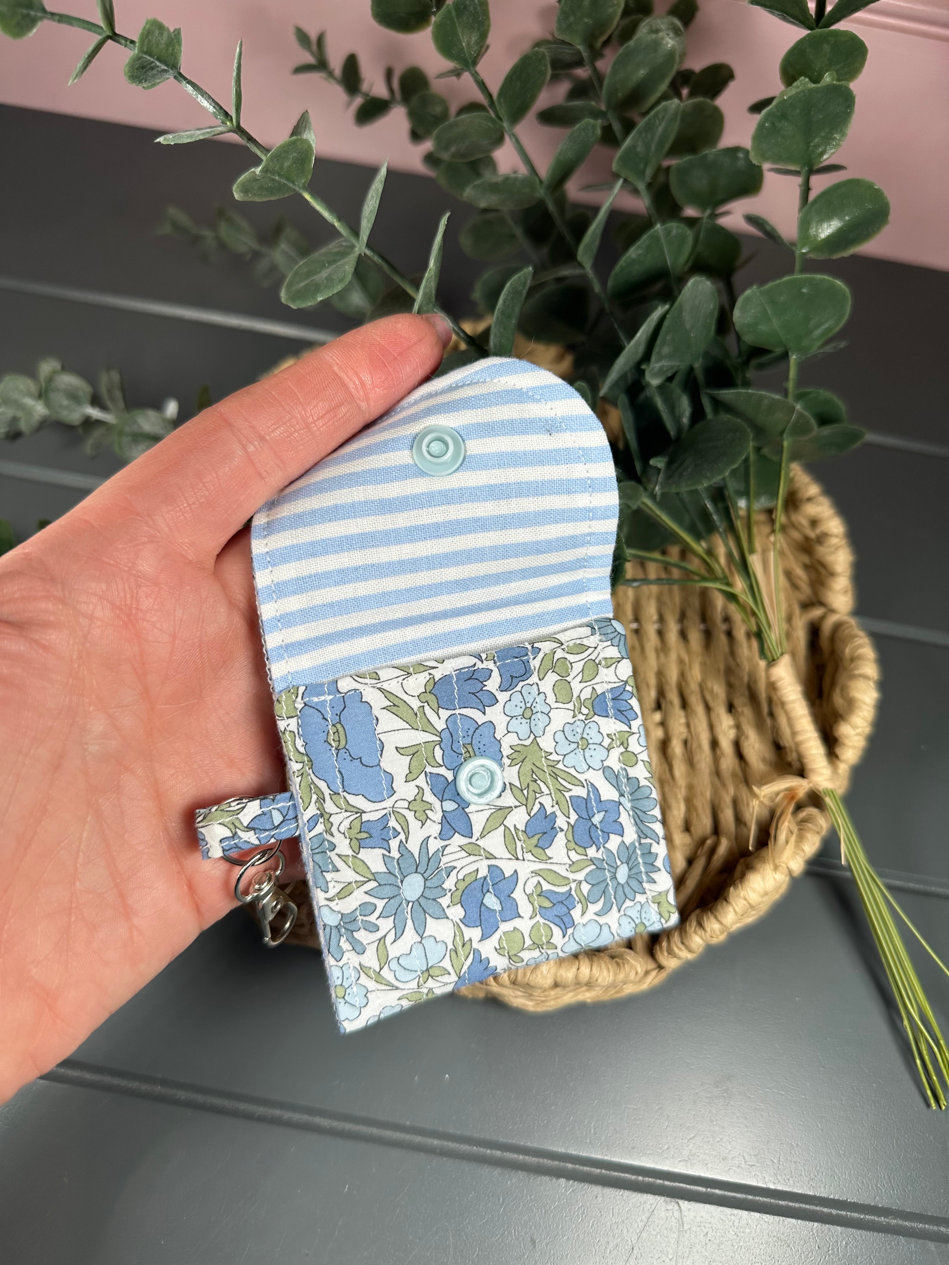 Blue floral quilted airpod case