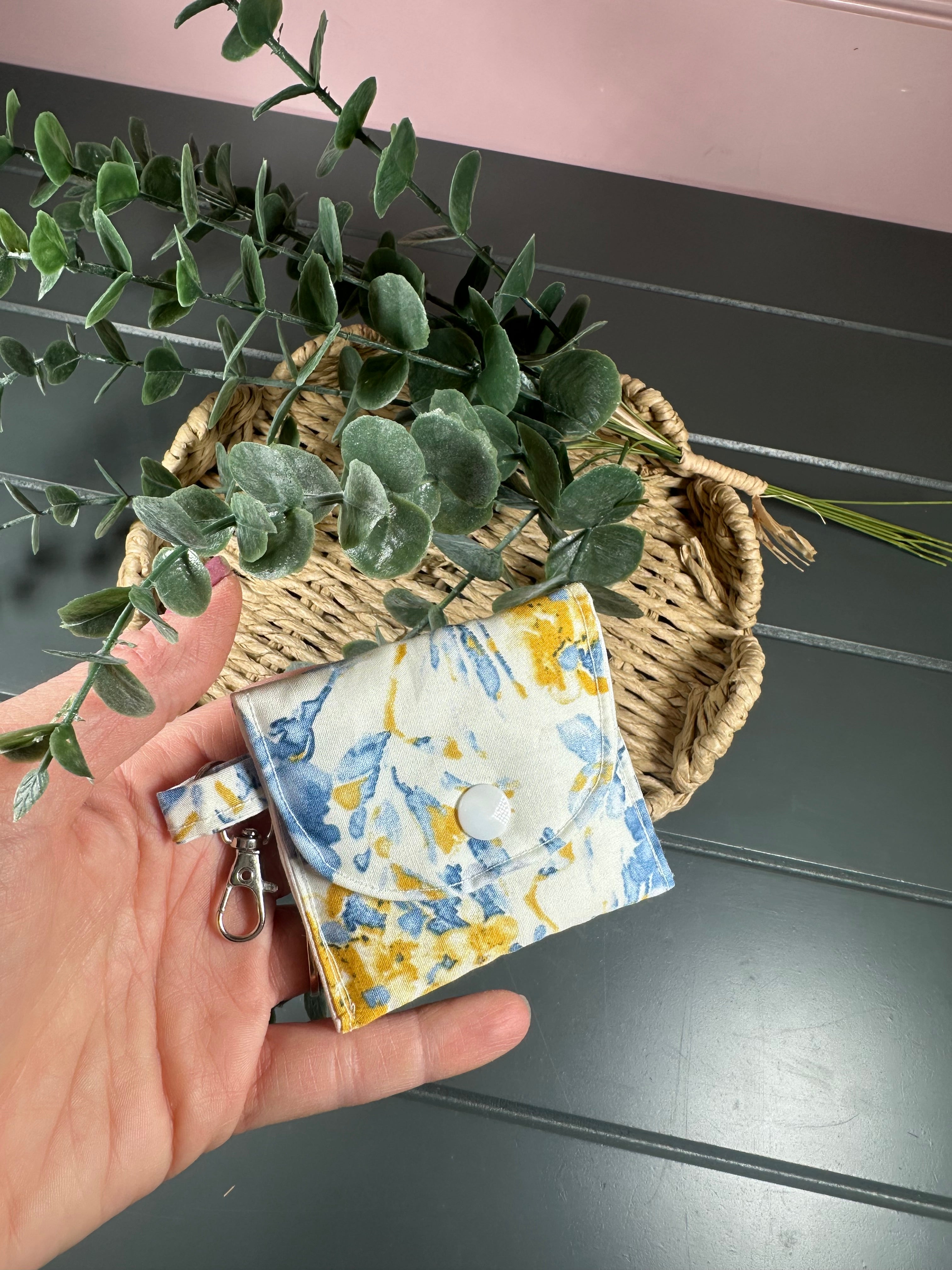 Blue and mustard floral airpod case