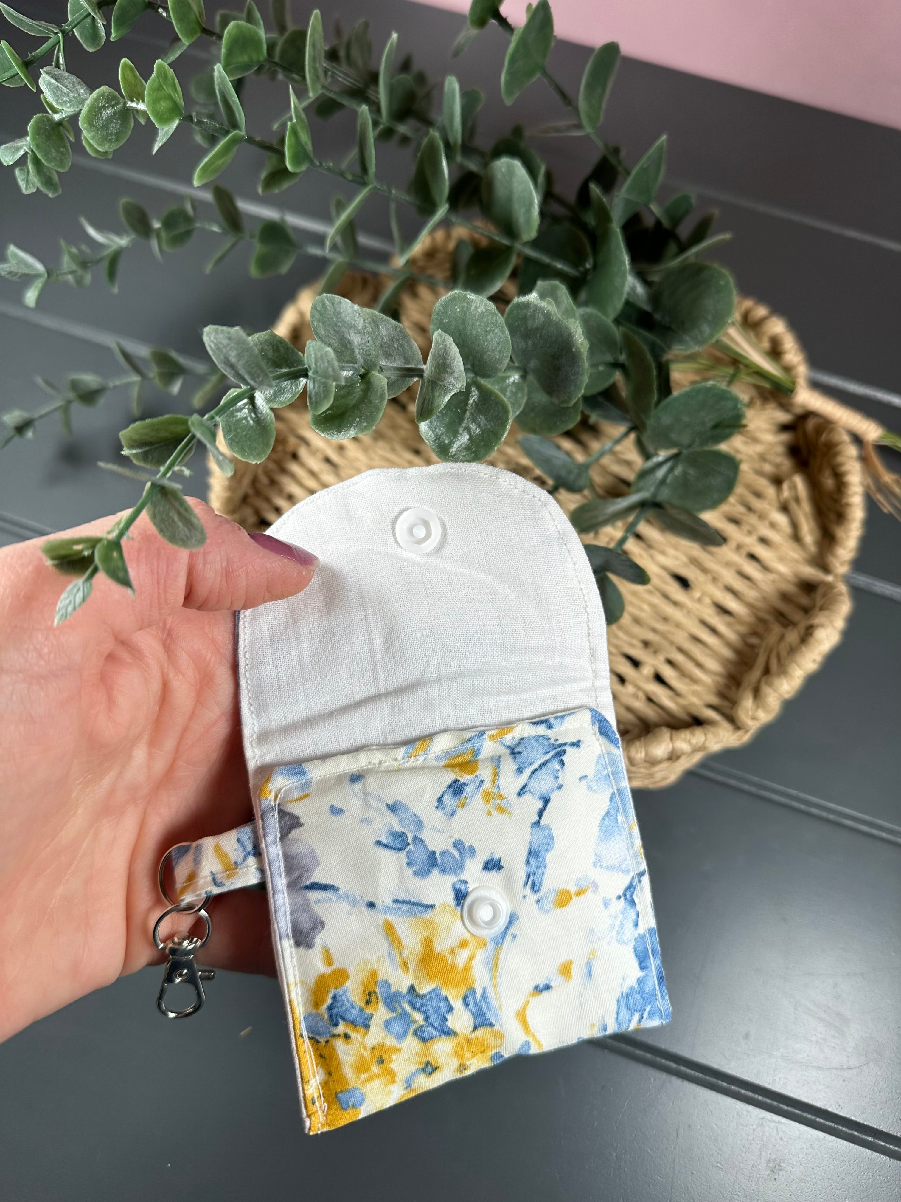Blue and mustard floral airpod case