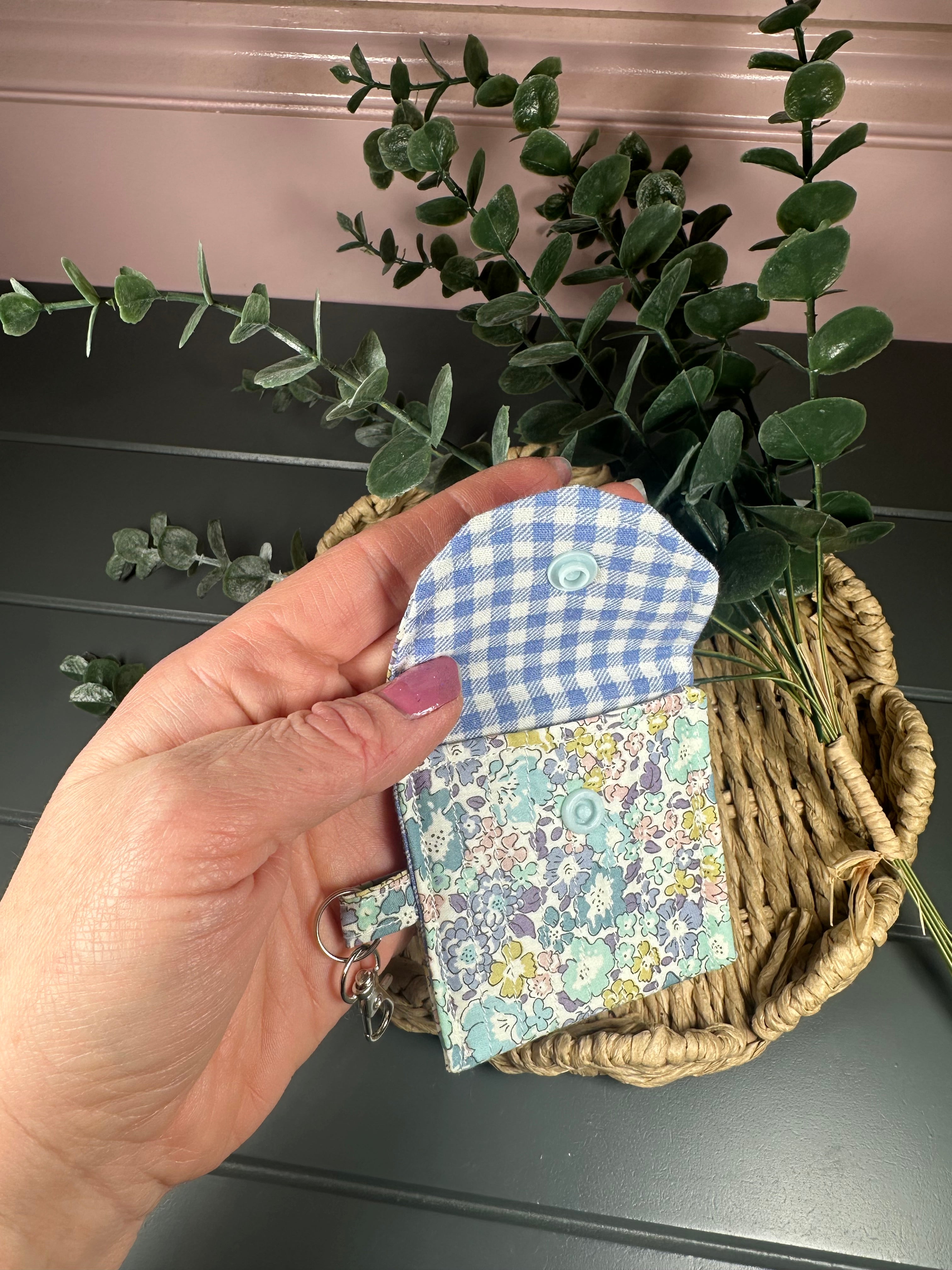 Blue floral quilted airpod case