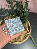 Blue floral quilted airpod case