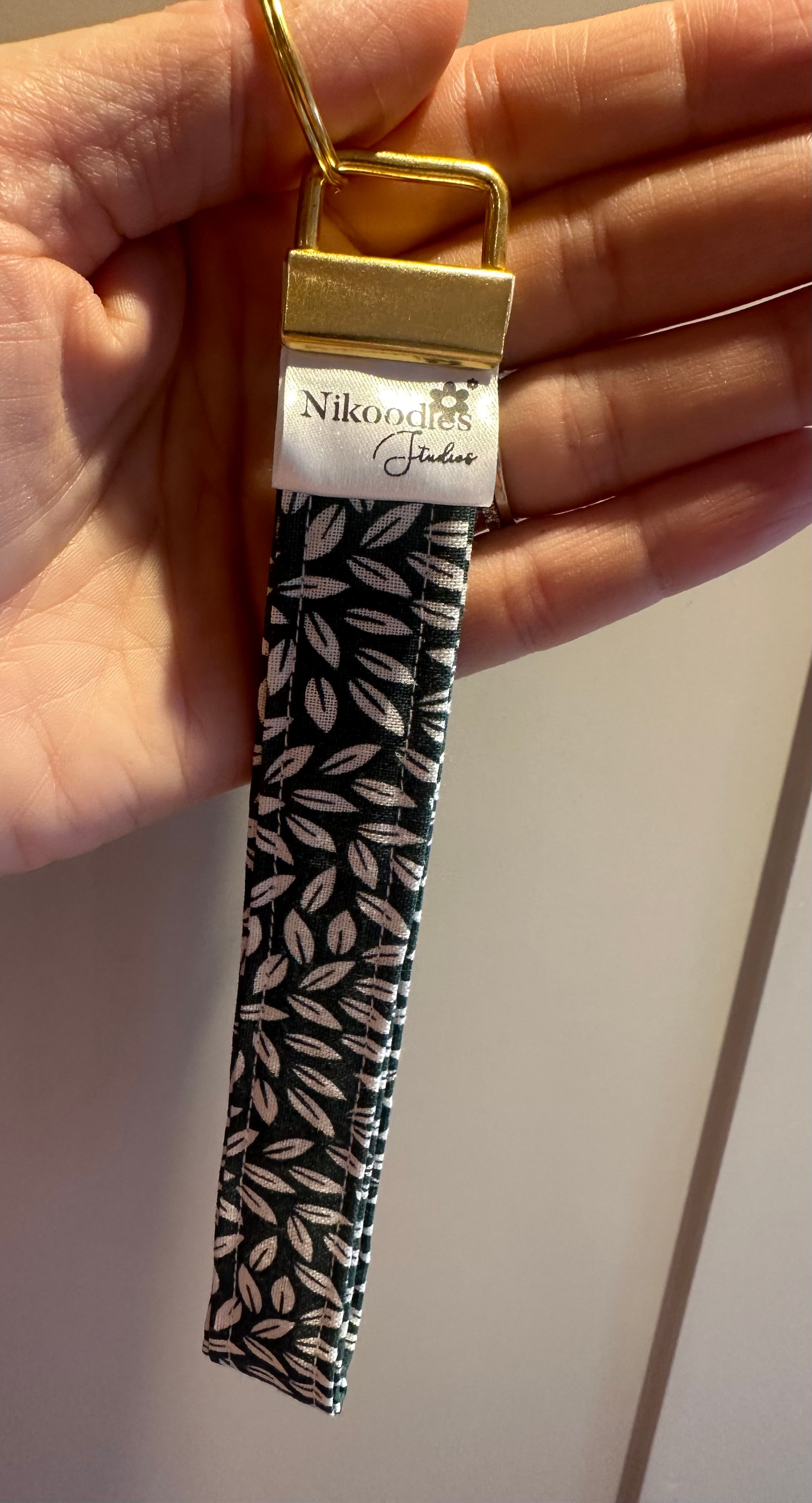 Large green with white leaves wristlet