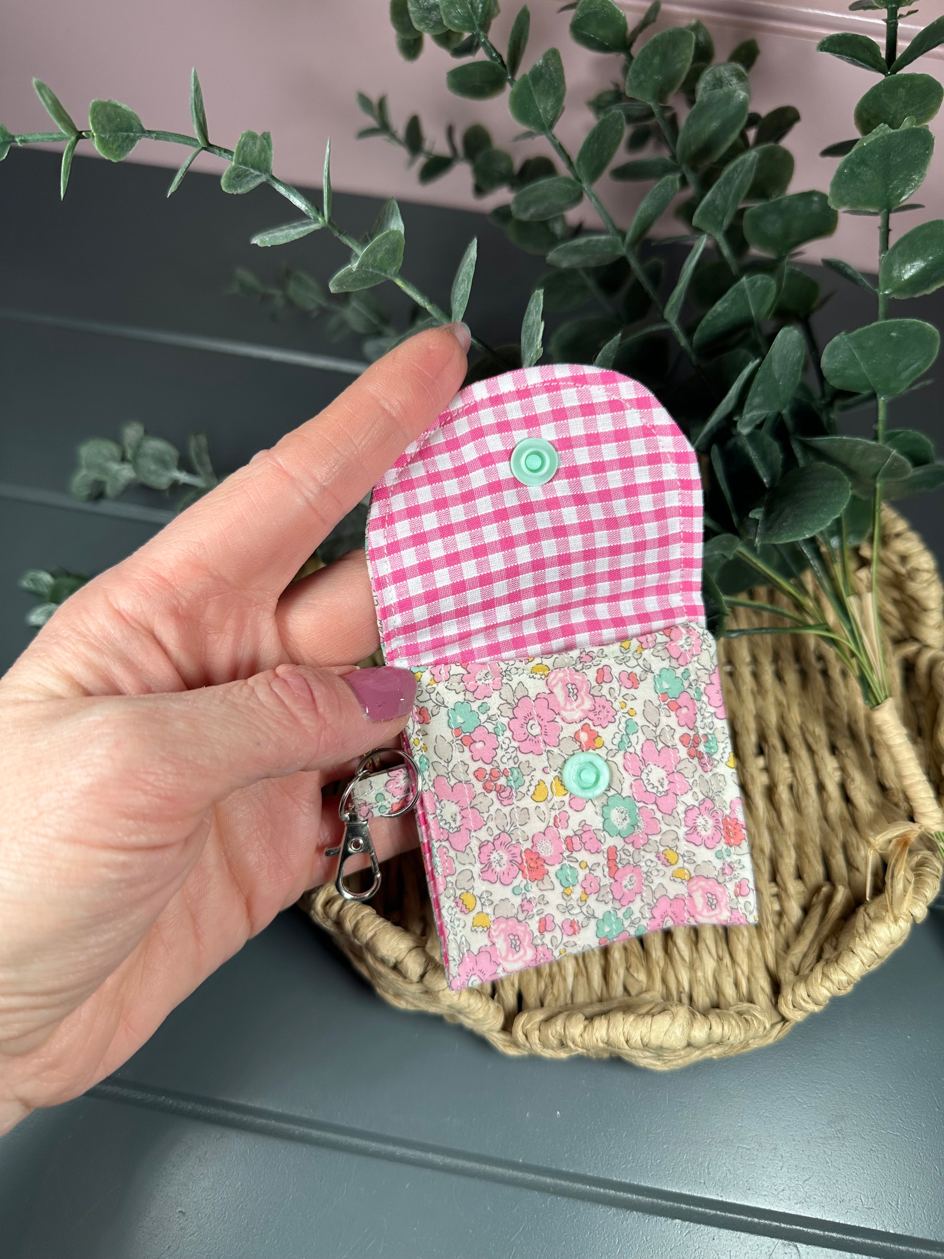 Pink floral quilted airpod case