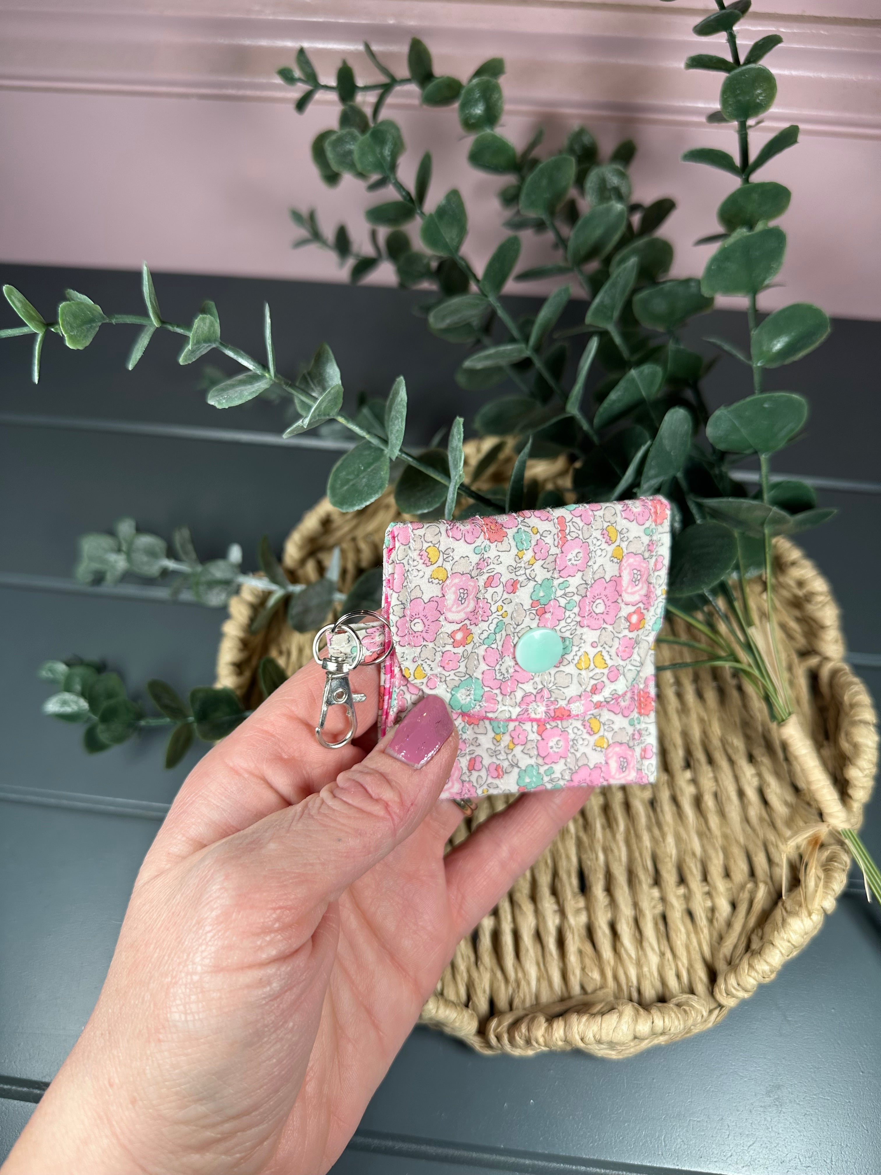Pink floral quilted airpod case